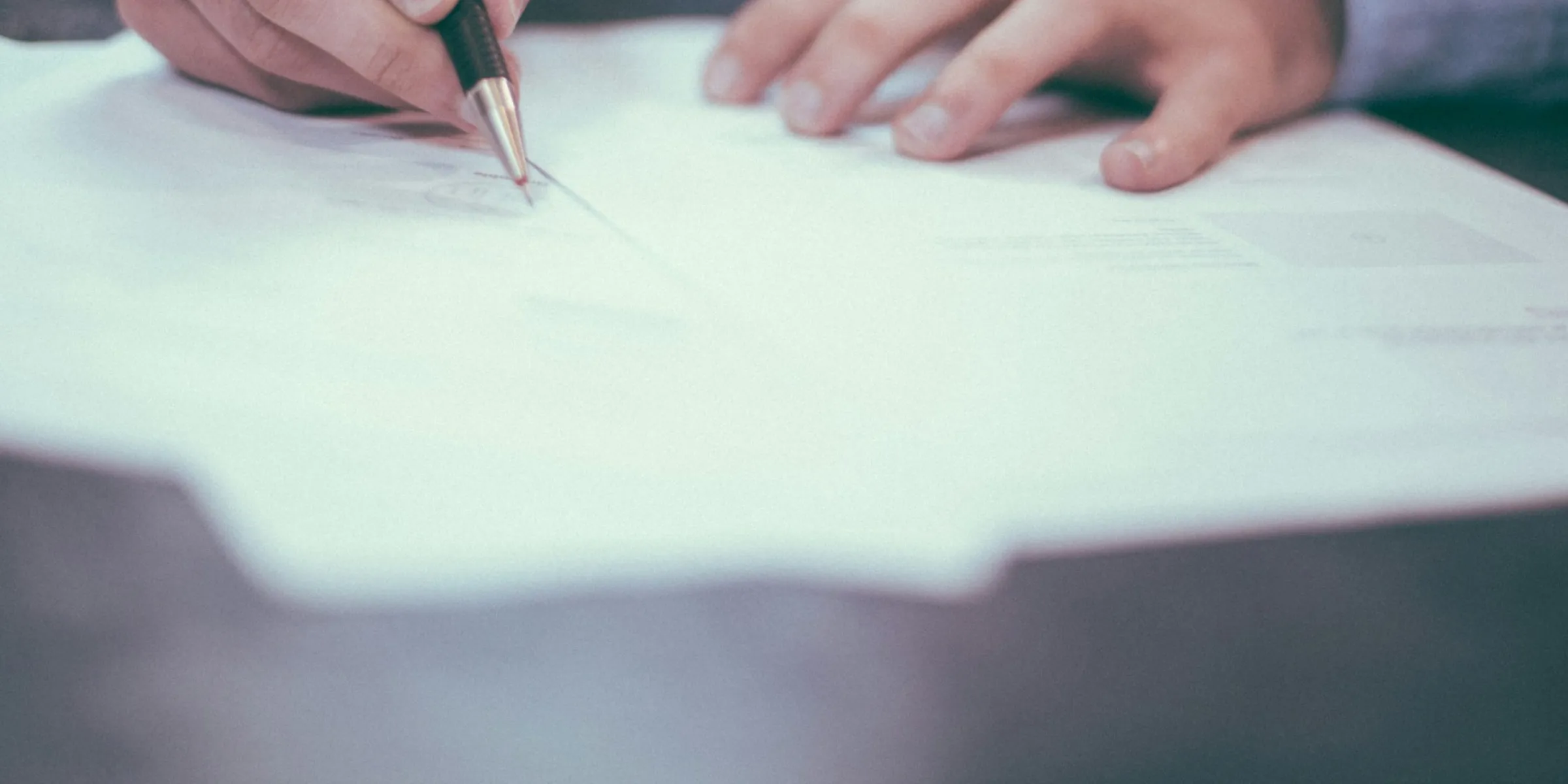 Man writing on paper